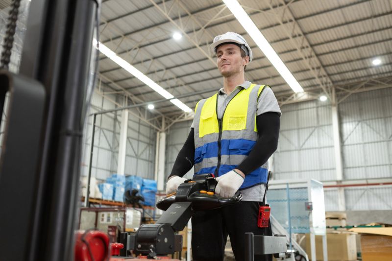 Rapid Response Warehouse Team Member On A Pallet Jack