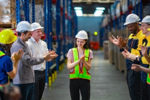 Empowering Workplace Moment in Warehouse by Praising A Female Employee